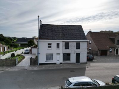 Voorgevel-gevelrenovatie-te-ruddervoorde-erna-isoboost-vooraanzicht-scaled.jpg